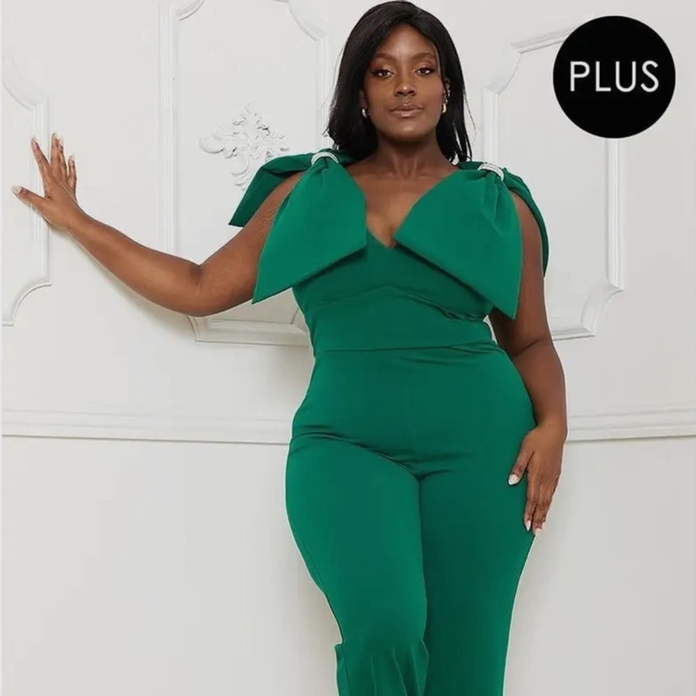 Alll tied up bow jumpsuit with rhinestone trim.